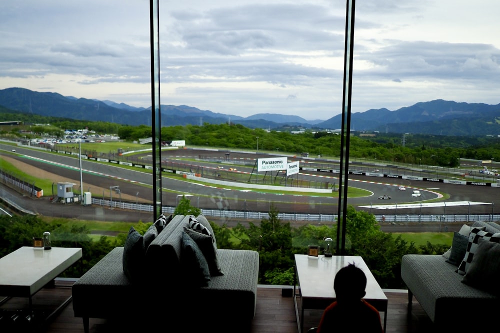 a view of a race track from inside a building