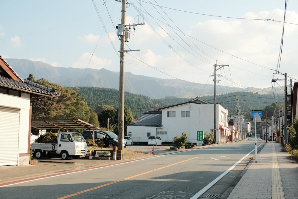 a street with a truck parked on the side of it