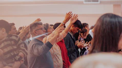 a group of people standing next to each other