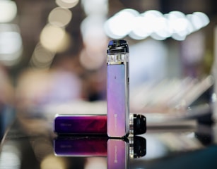 a close up of two electronic devices on a table