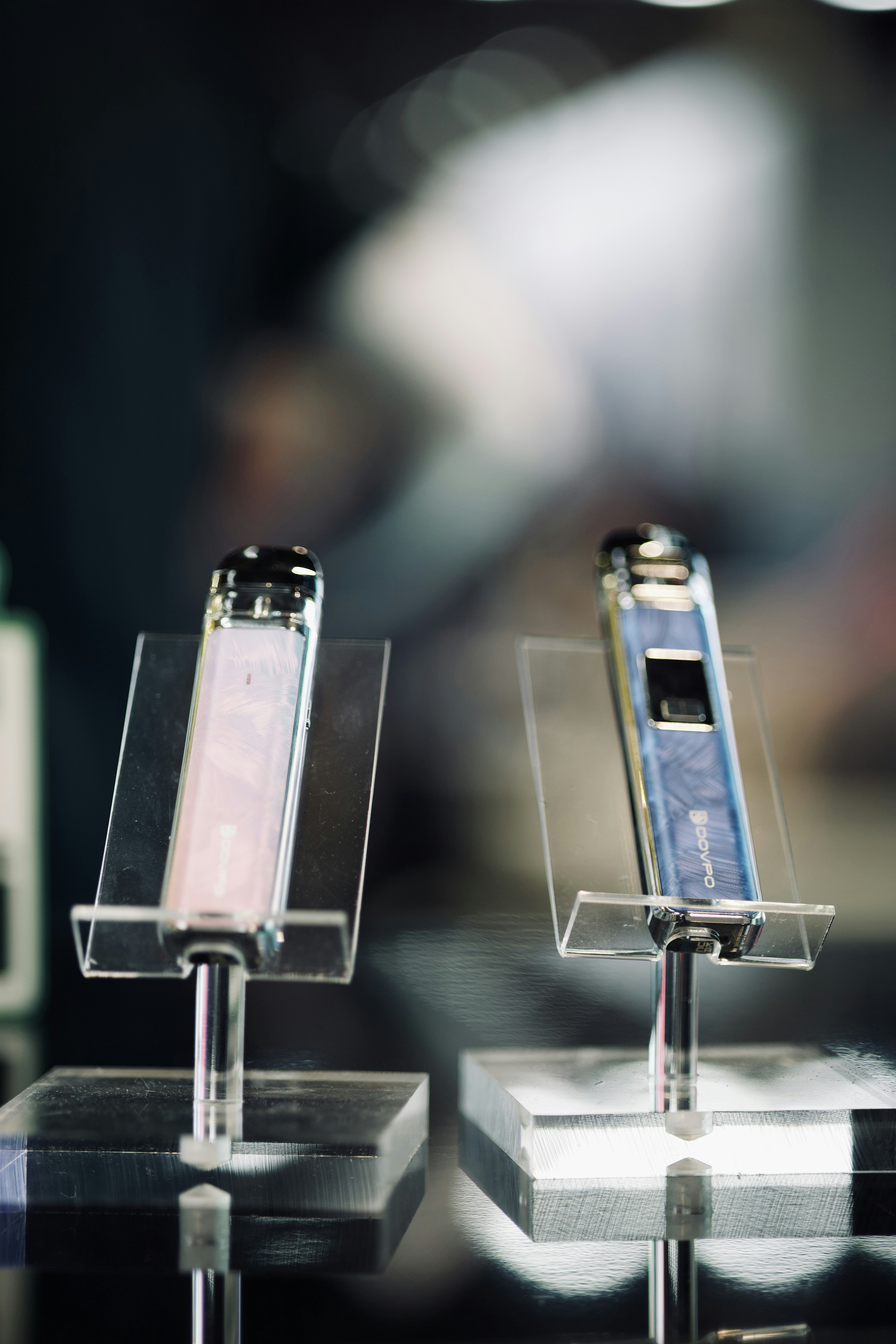 a couple of cell phones sitting on top of each other