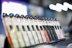 a row of pens sitting on top of a table
