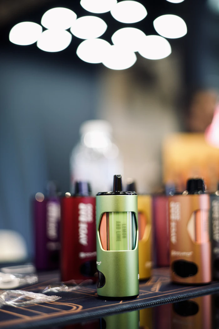Group of pod vape devices displayed on a table