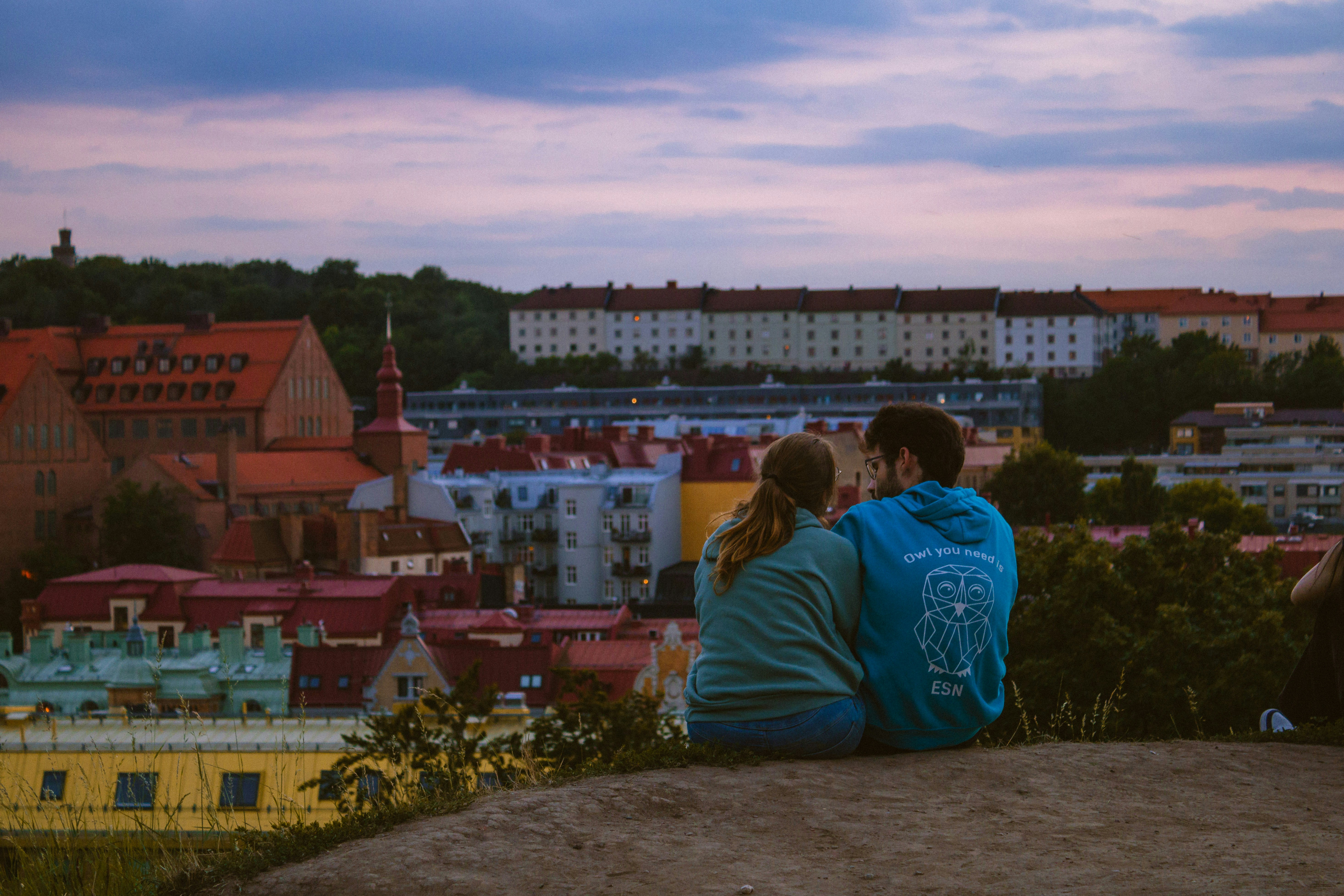 A couple watching sunset together