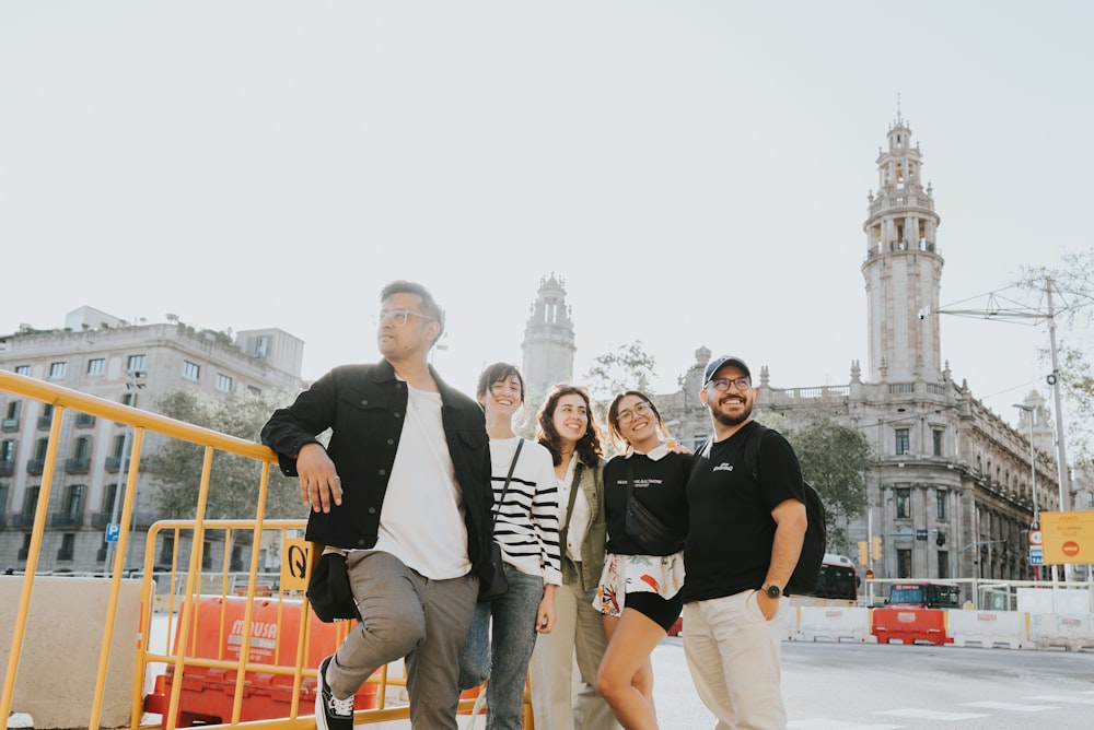 a group of people standing next to each other