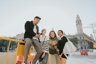 a group of people standing next to each other