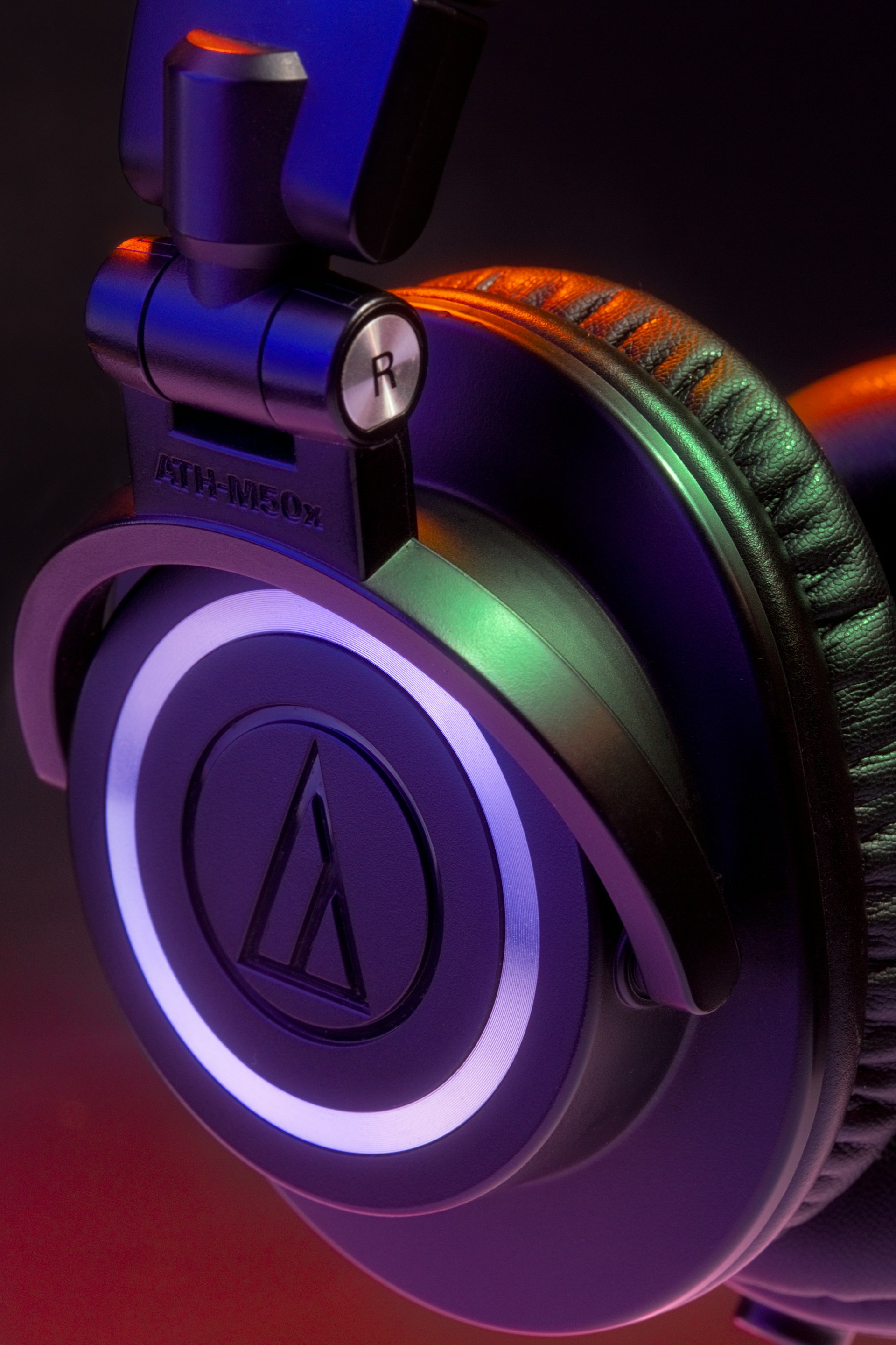 a pair of headphones sitting on top of a table