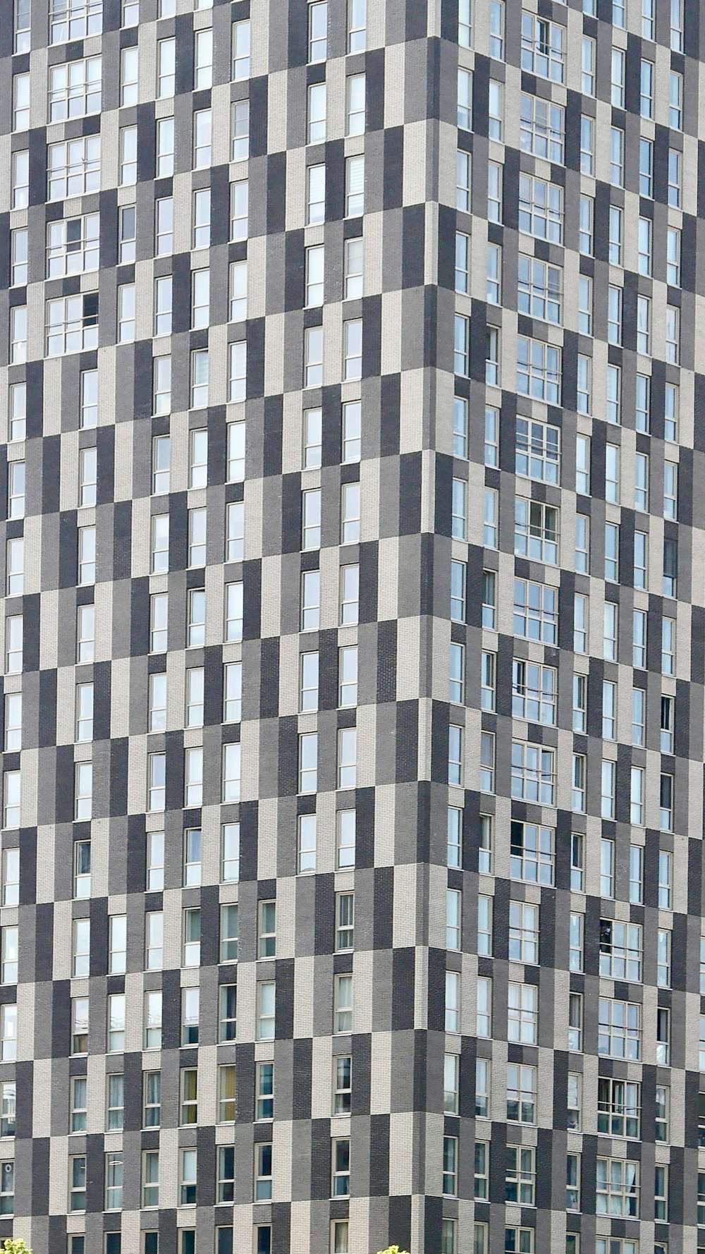 a very tall building with many windows on it
