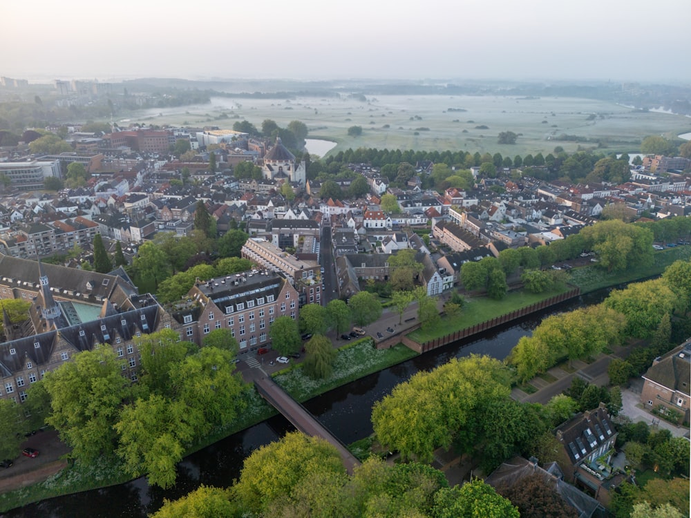 an aerial view of a city with a river running through it