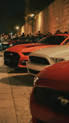 a group of cars parked next to each other