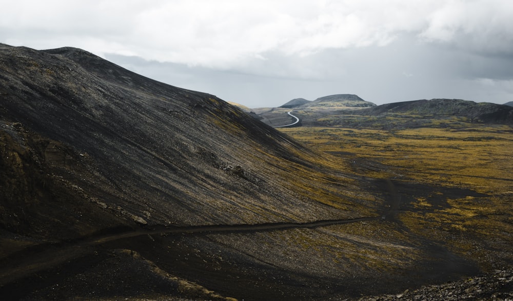 a mountain with a road going through it