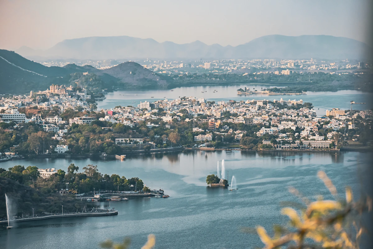 A lake ringed by hills and the city
