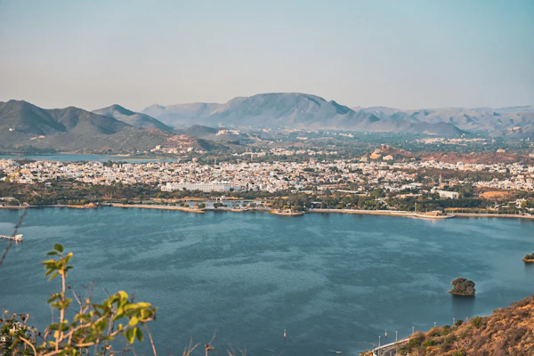 A lake surrounded by green hills