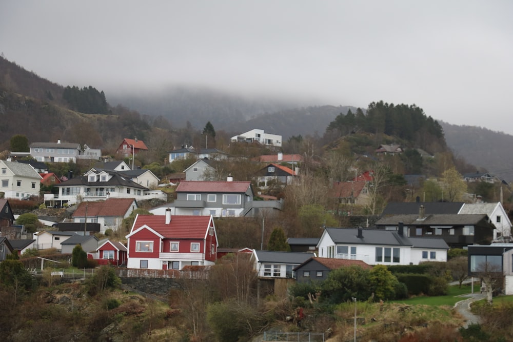 a view of a town with houses on a hill