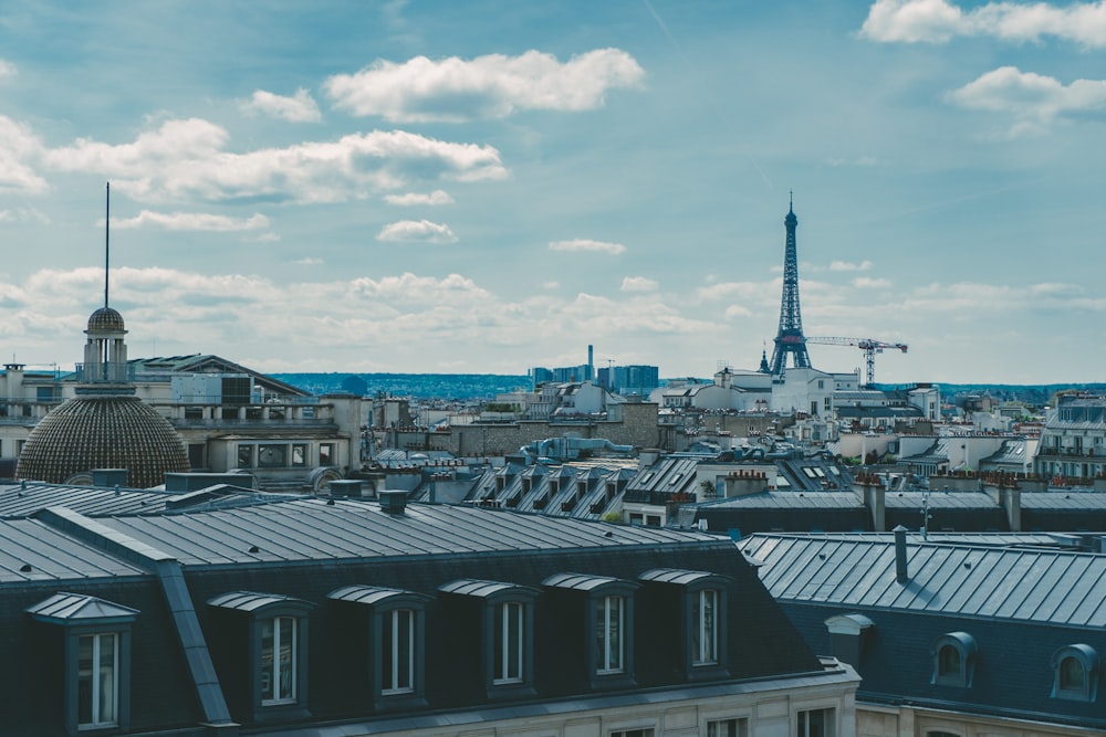 a view of the eiffel tower from the roof of a building