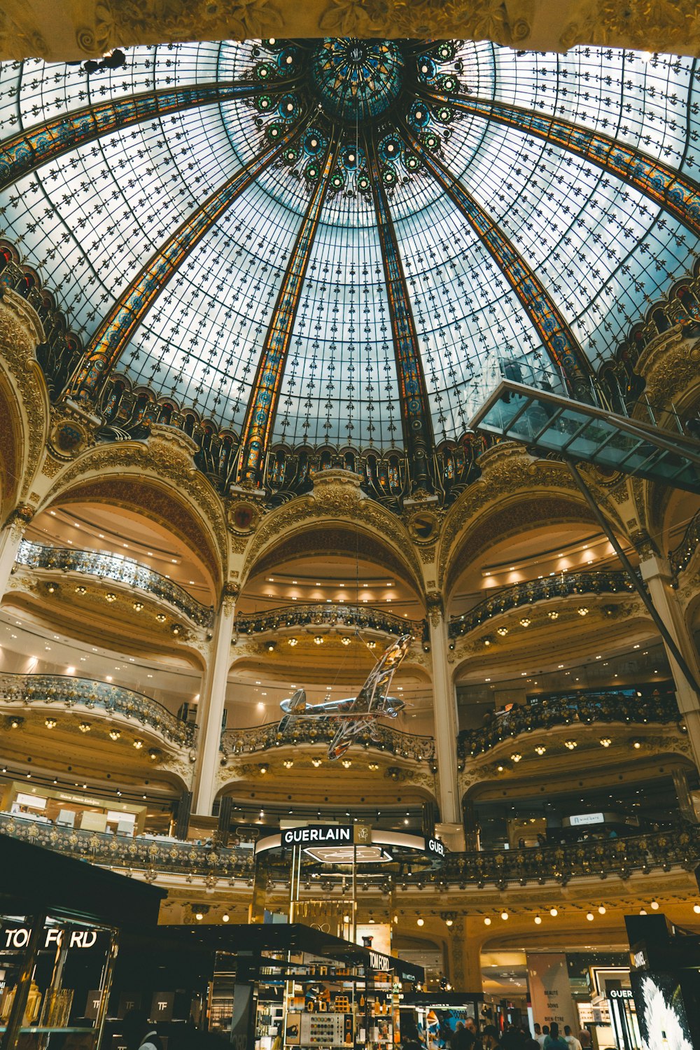 the inside of a large building with a glass ceiling