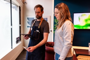 a man and a woman standing in a room