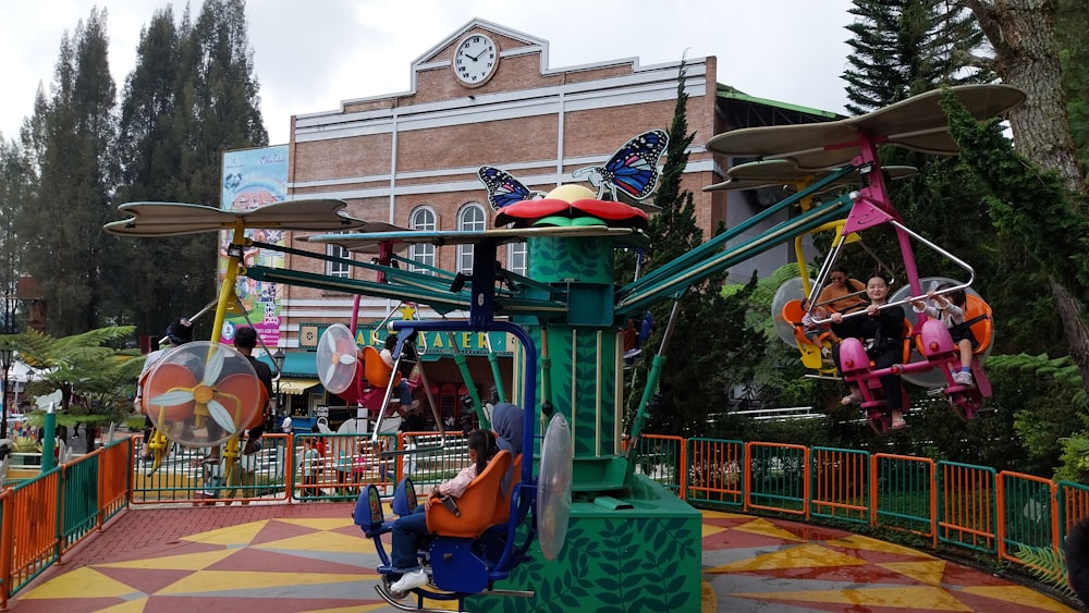 an amusement park with a colorful theme park ride