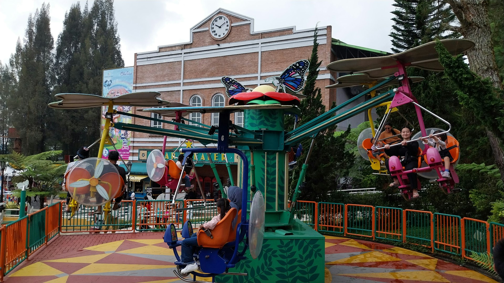 an amusement park with a colorful theme park ride