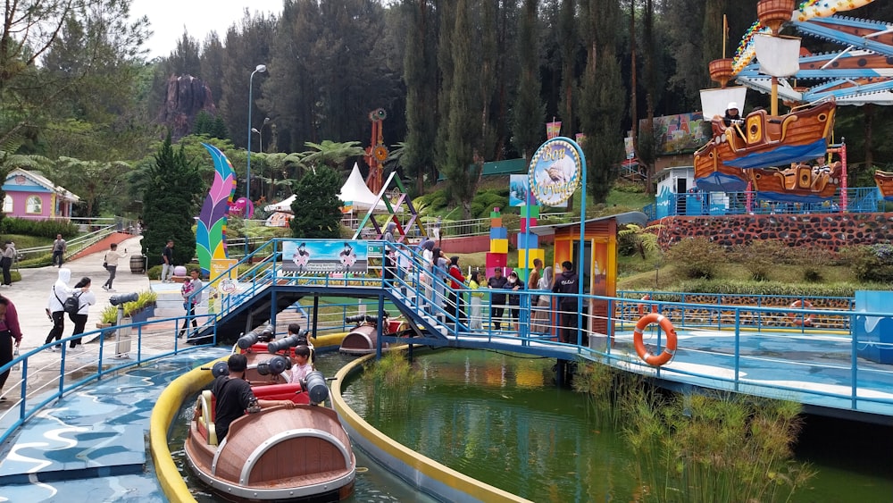 a small boat rides through a water park