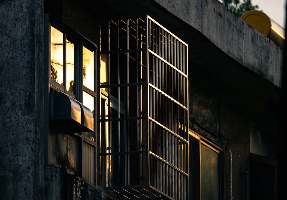 a window with bars on the outside of it
