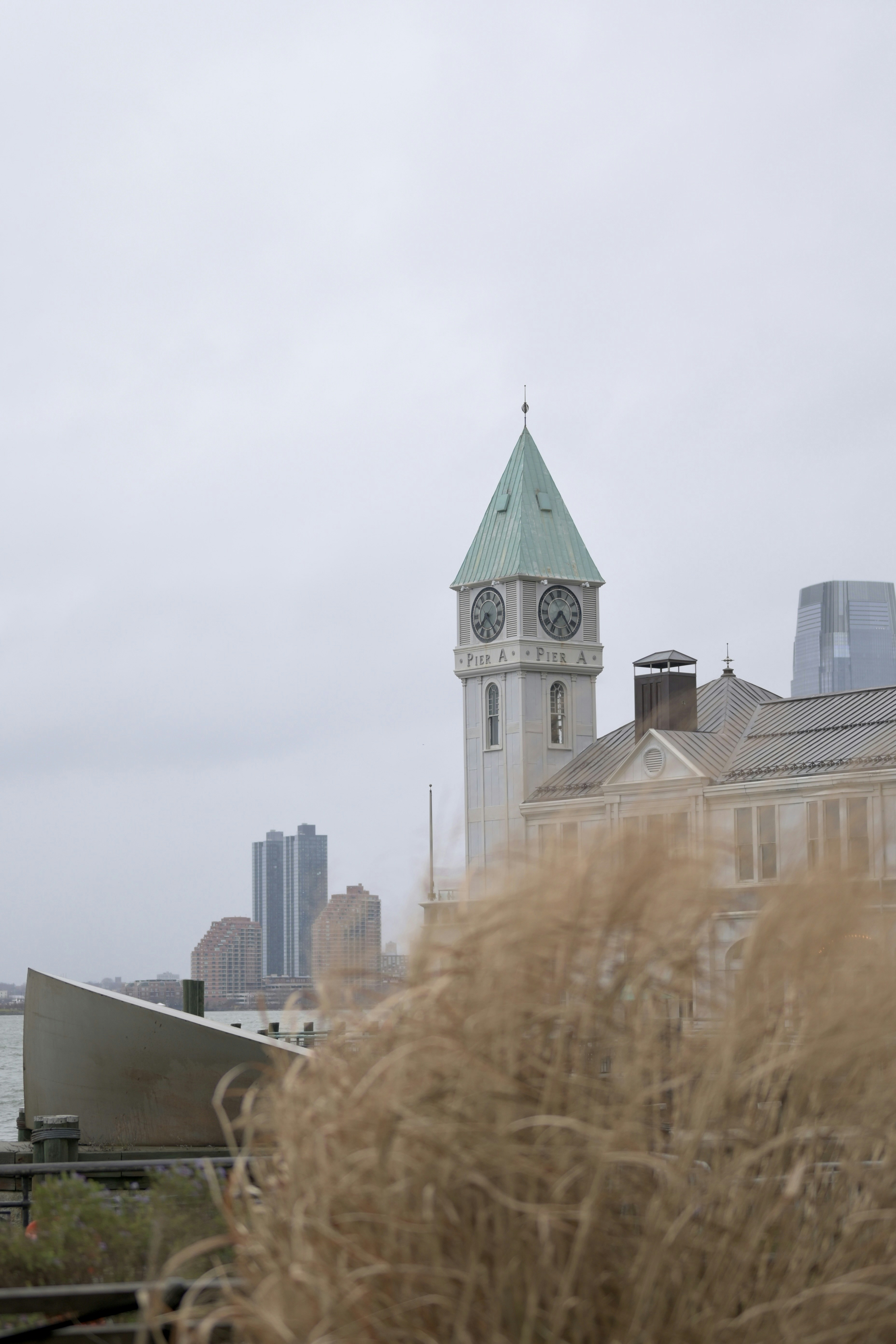 A tall clock tower towering over a city photo – Free Tower Image on ...