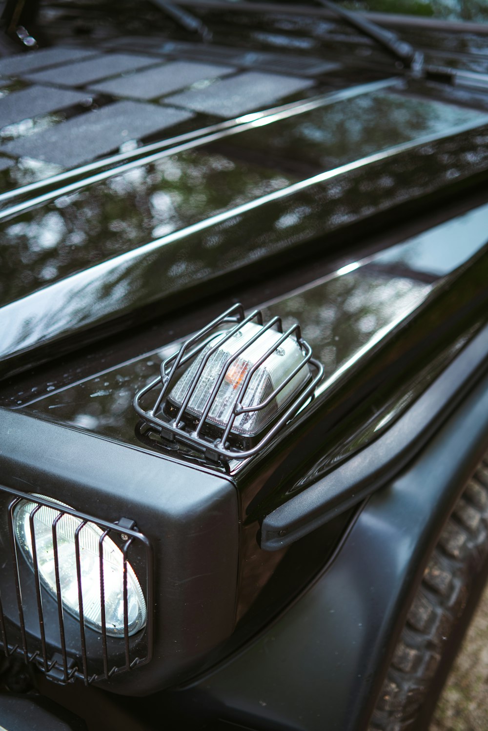 a close up of a grill on a car