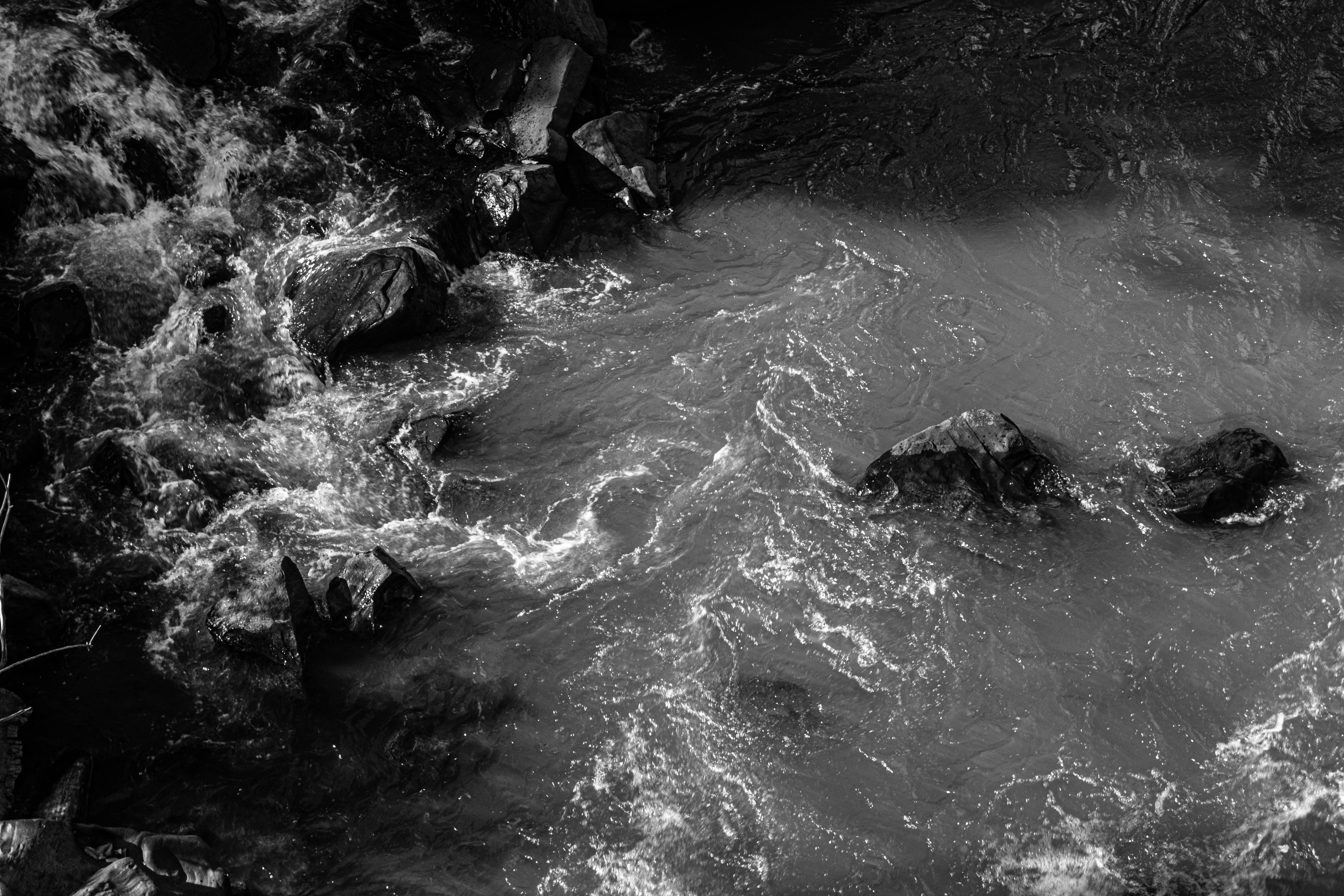 a black and white photo of a body of water