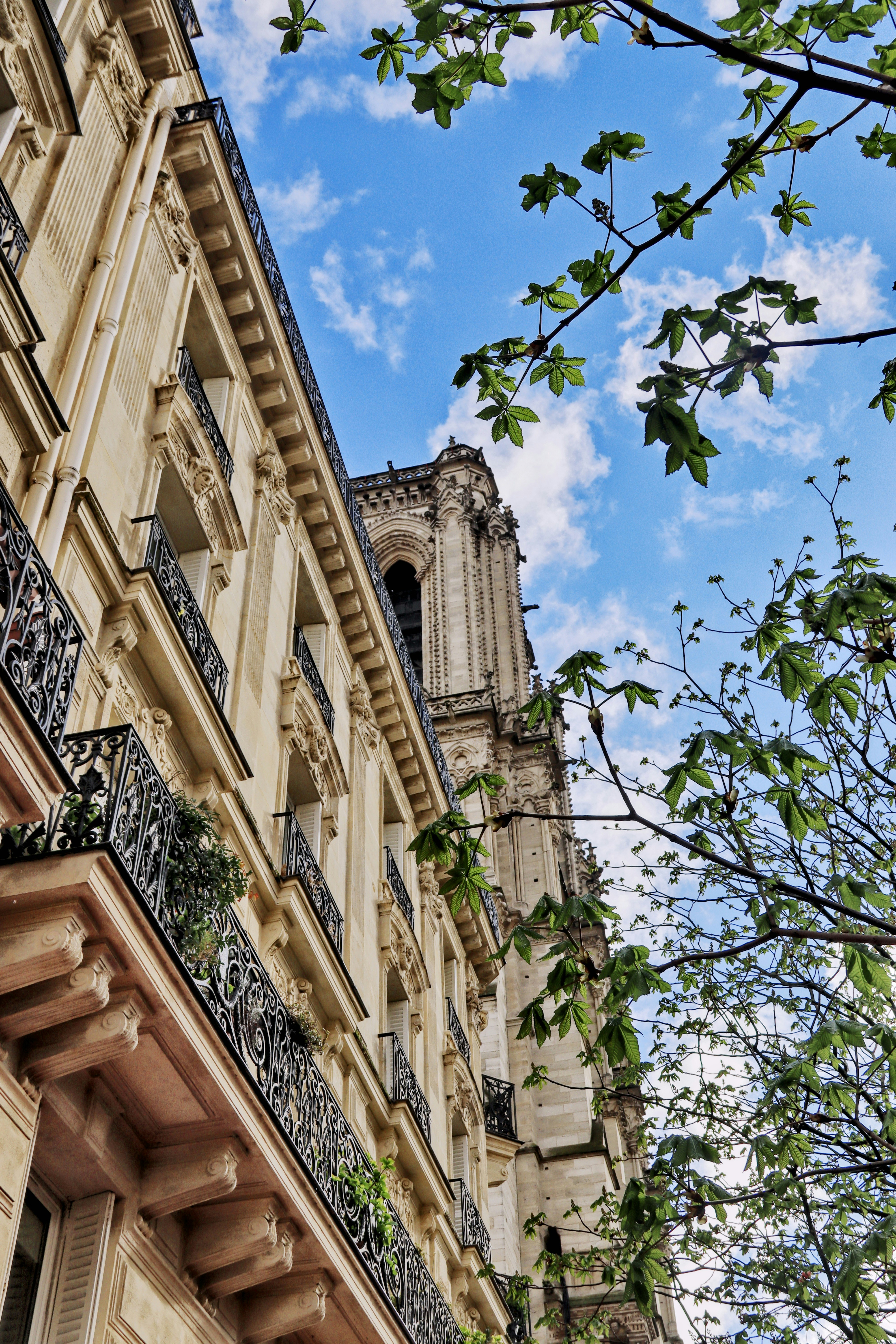 a tall building with a clock on the front of it