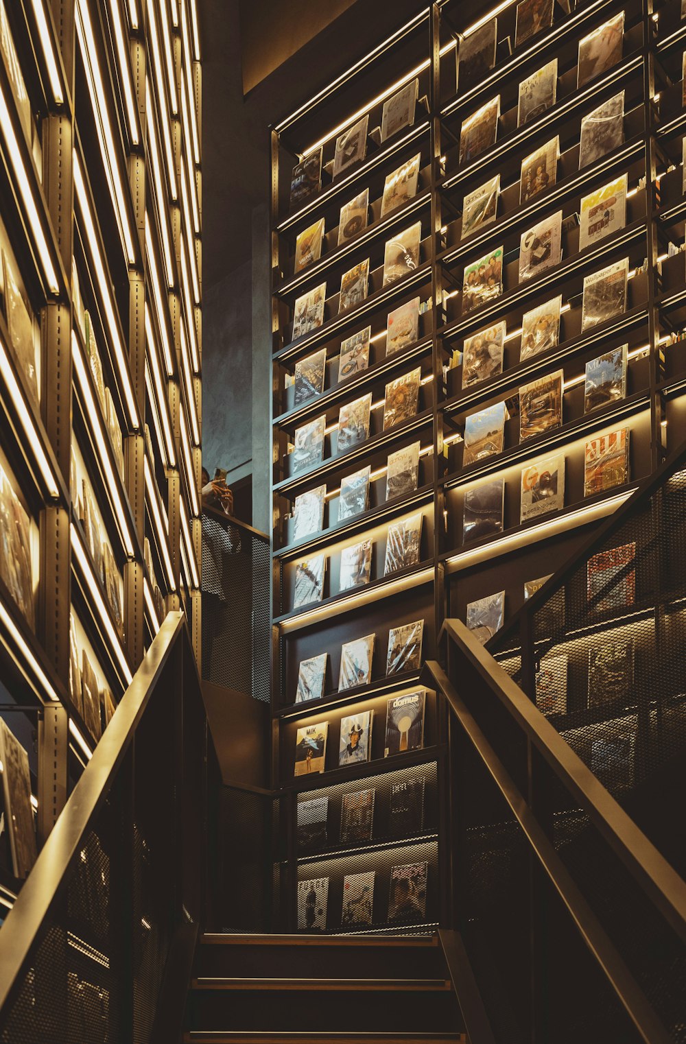 a bunch of books that are on a wall