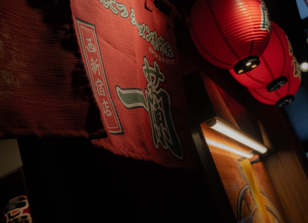 a red paper lantern hanging from the ceiling,
