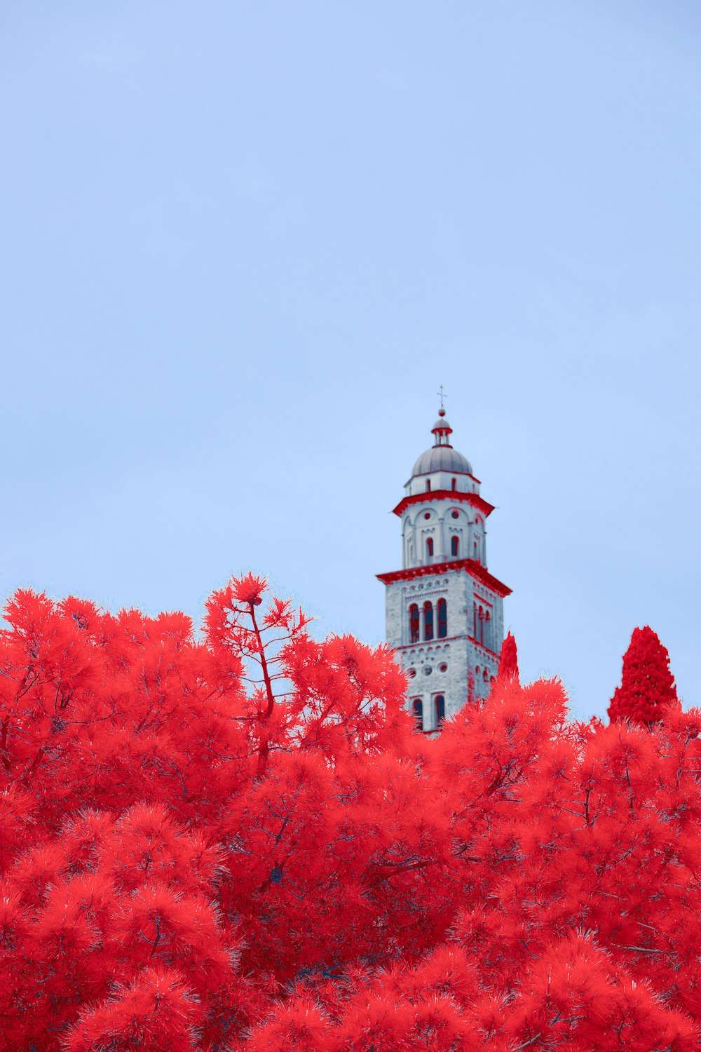 a tall tower with a clock on top of it