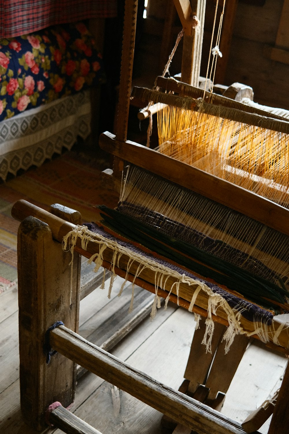 a close up of an old weaving machine