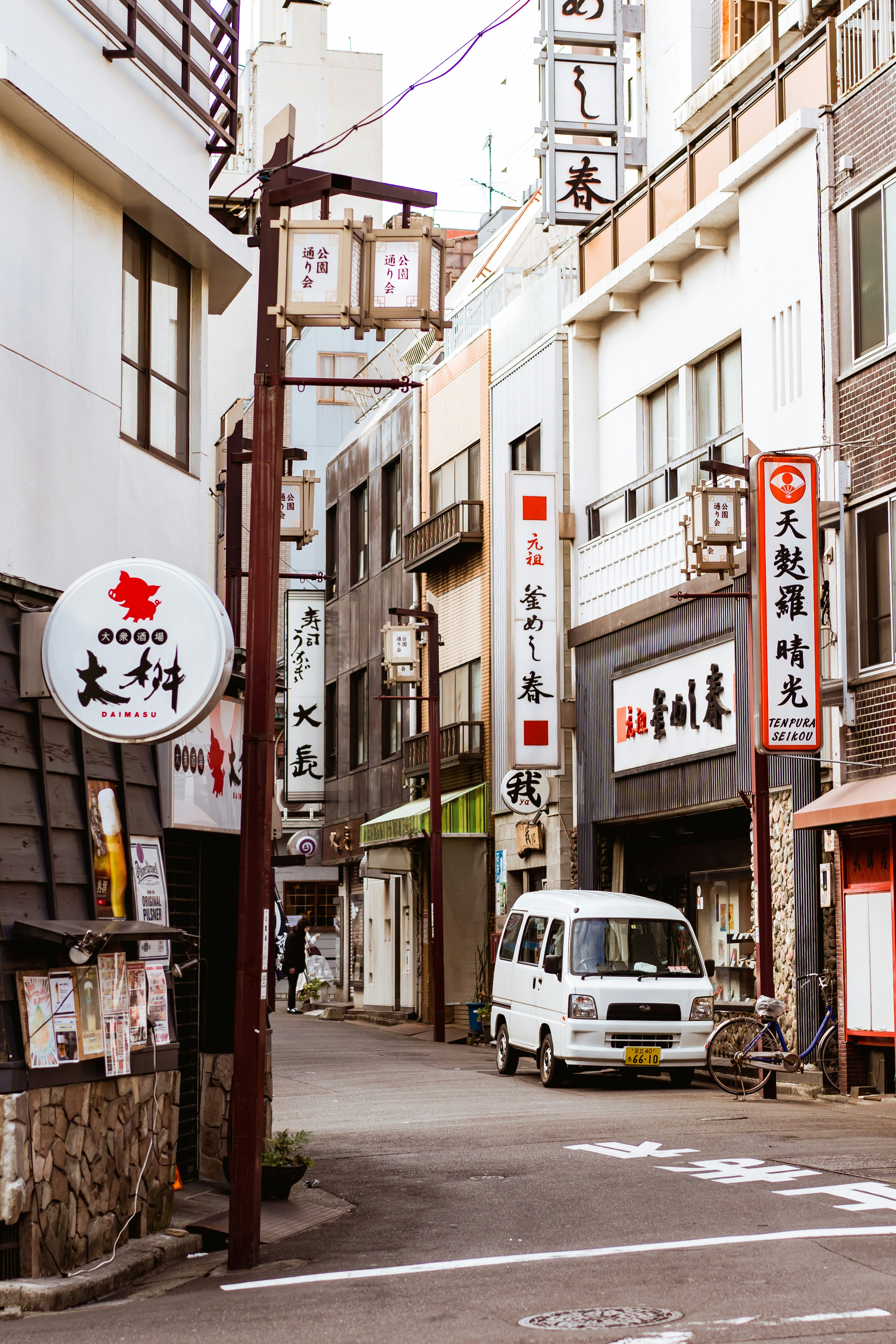 a van is parked on the side of the road