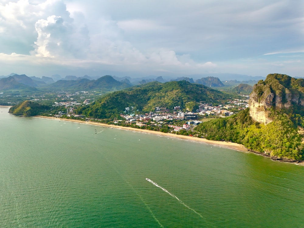 an aerial view of a small island in the middle of a body of water