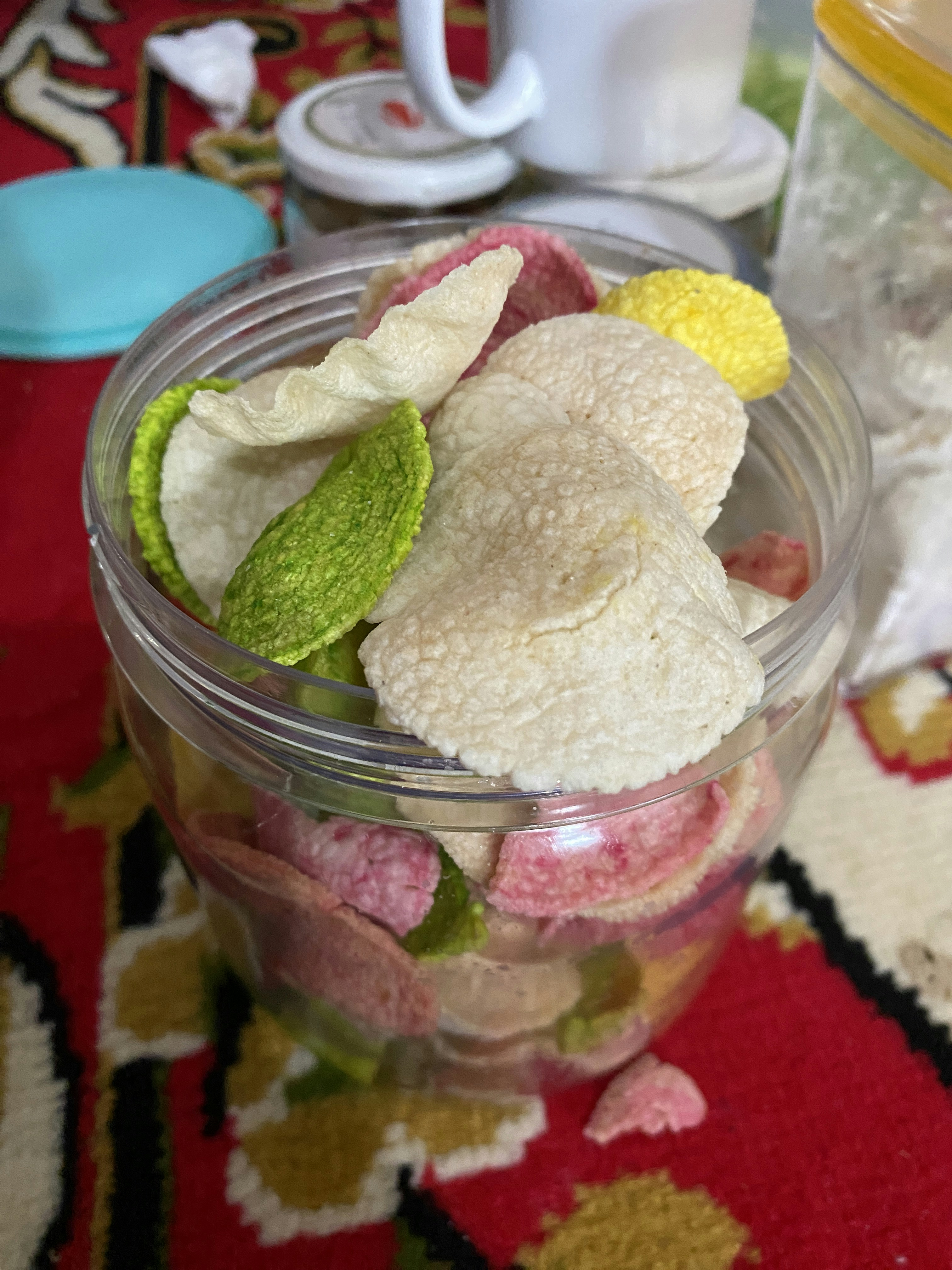 a glass jar filled with a variety of food