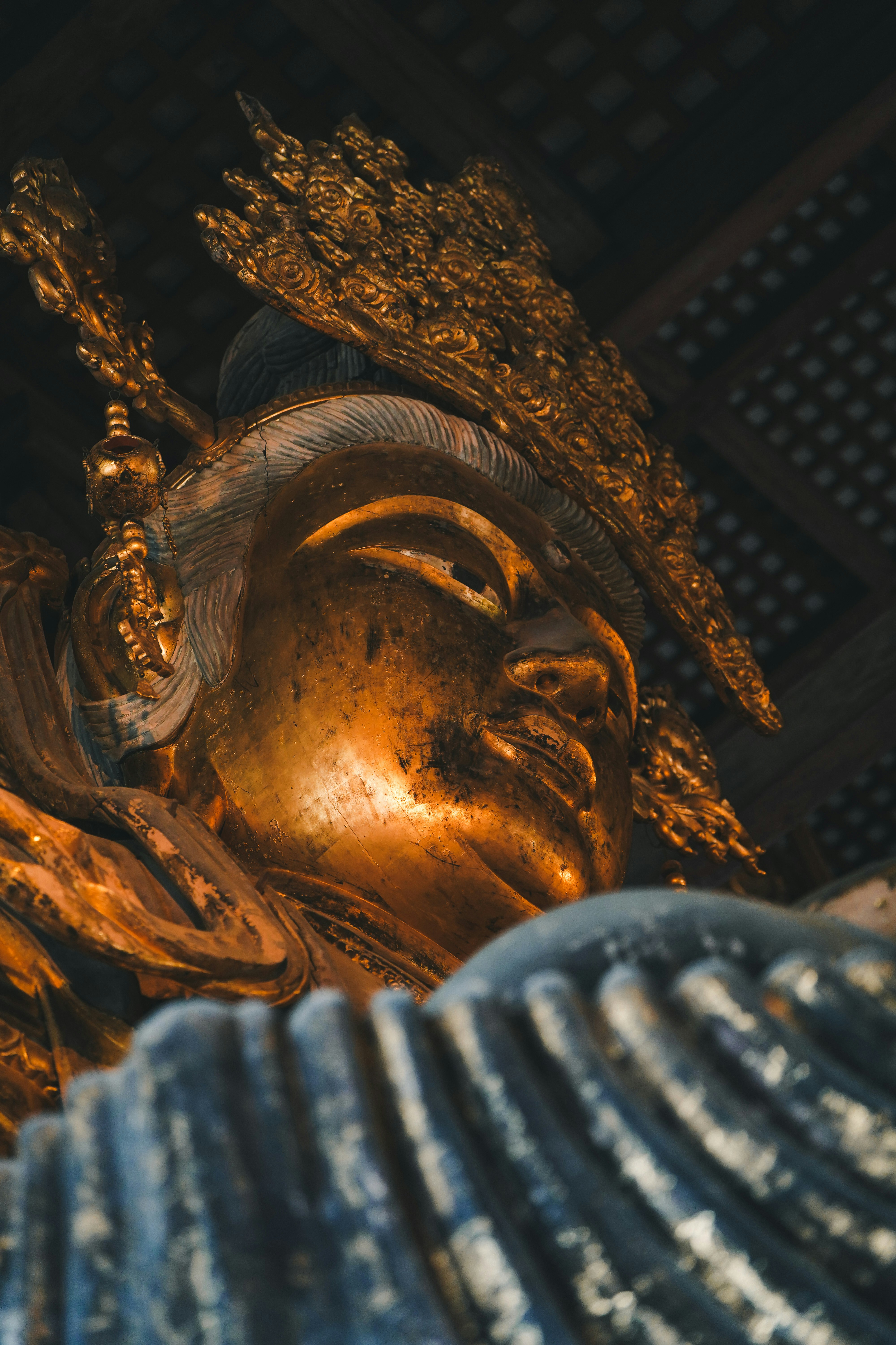 a statue of a person with a crown on it's head