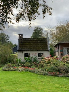 Handyman swindon property maintenance house with a garden in front of it