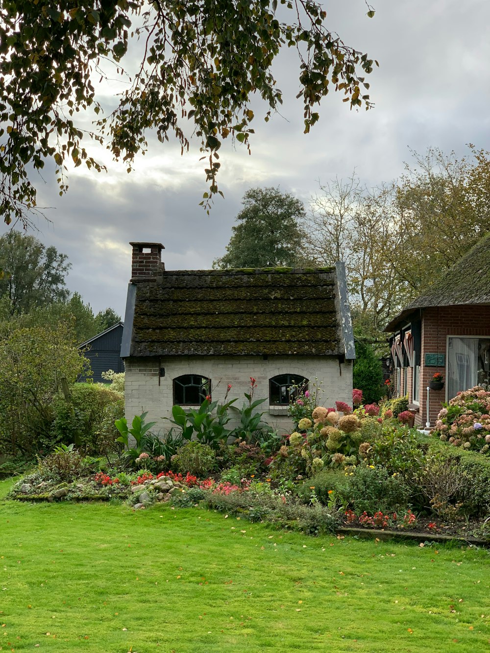 a house with a garden in front of it