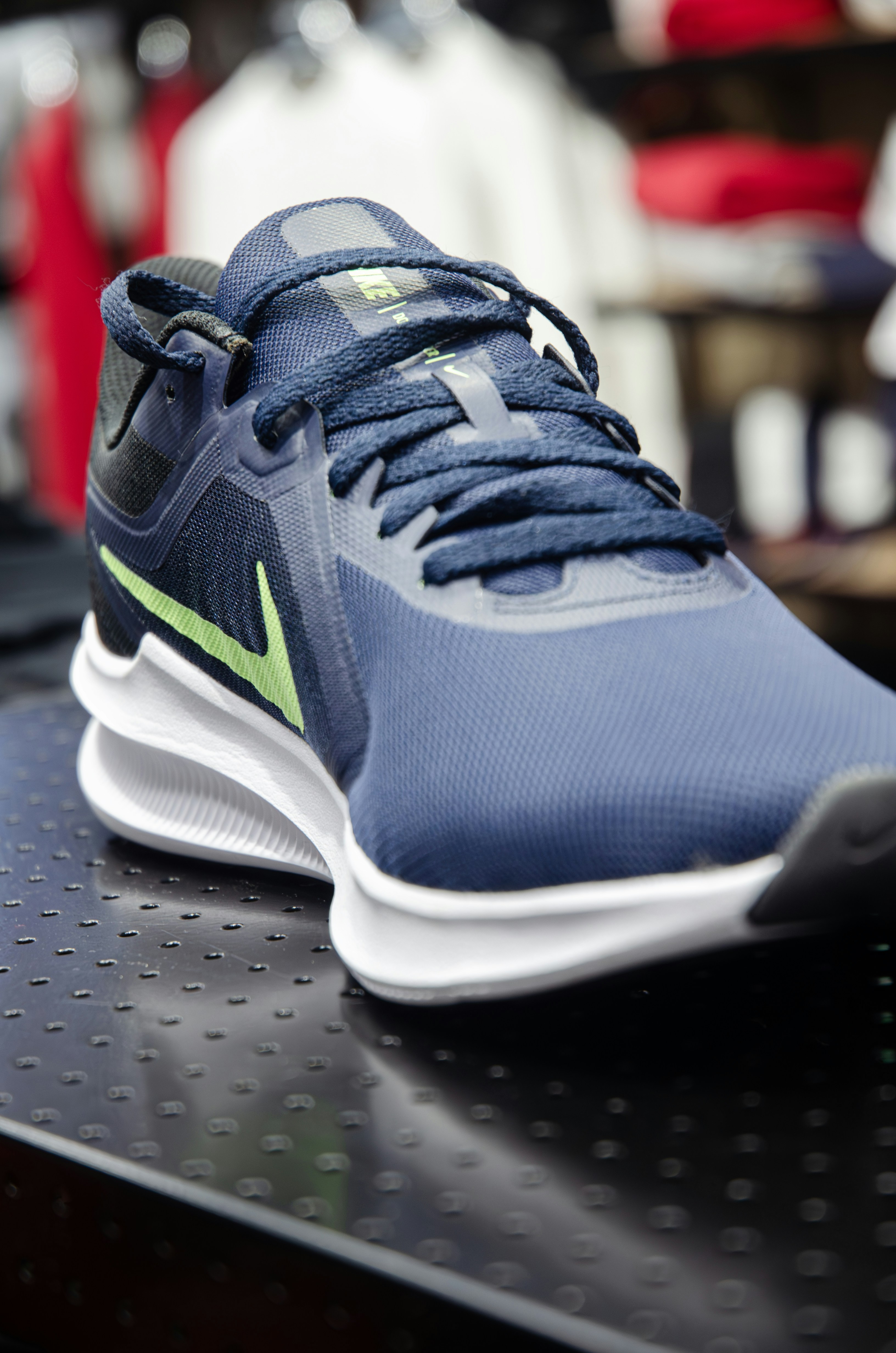 Nike Pegasus 41 athletic shoe side profile on clean dark surface