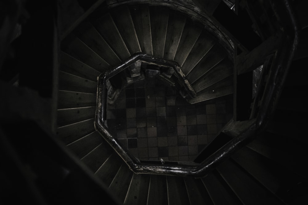 an overhead view of a spiral staircase in a building