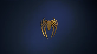 a golden spider logo on a dark blue background