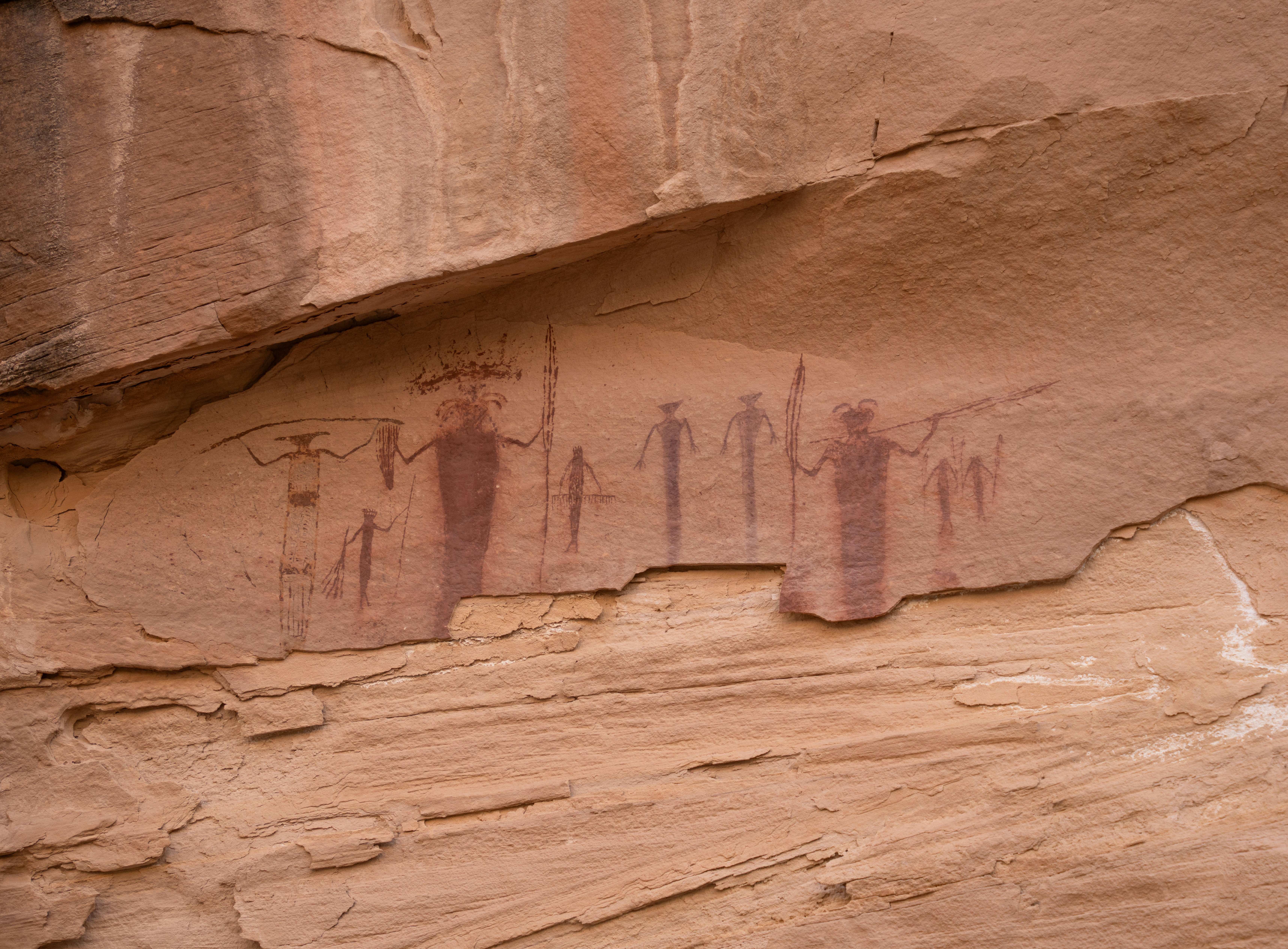 A large rock with some writing on it