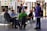 a group of people sitting around a table