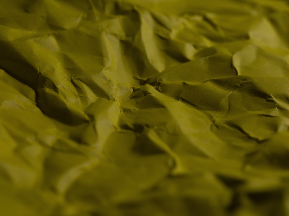 a close up of a piece of yellow paper