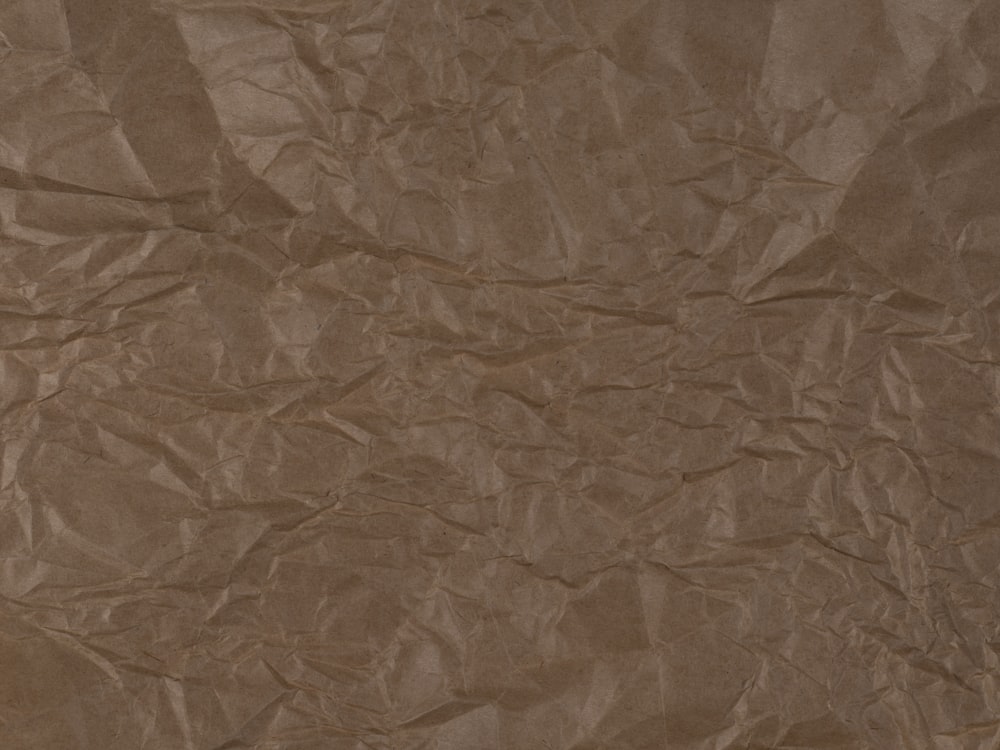 a piece of brown paper that has been wrinkled