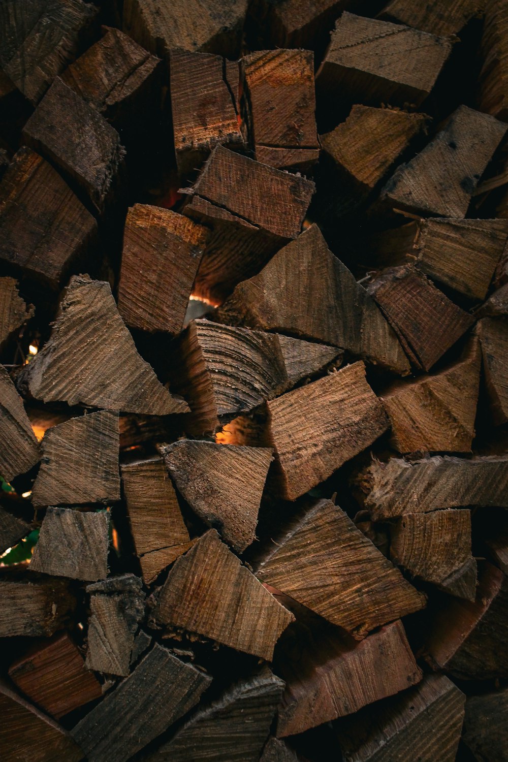 a pile of chopped wood sitting next to each other