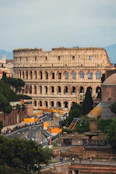a view of the roman colossion from the top of a hill