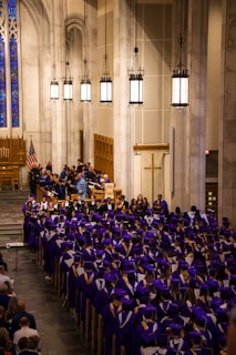 a large group of people in graduation gowns