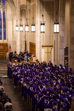 a large group of people in graduation gowns